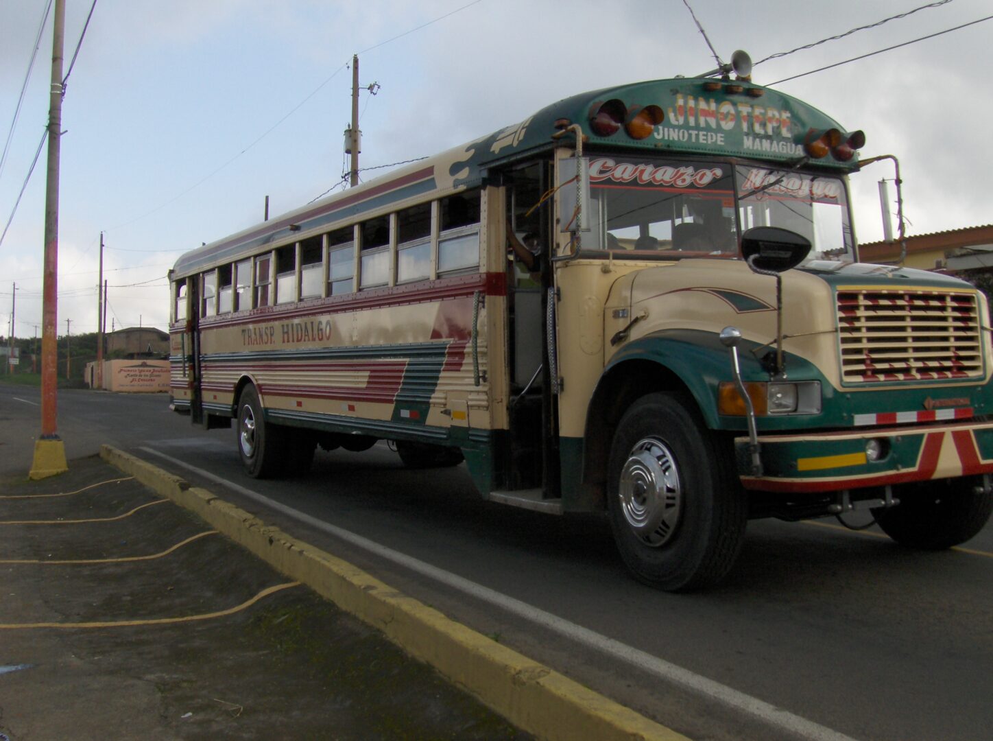 A Vintage Bus in Yellow Color With Green Details
