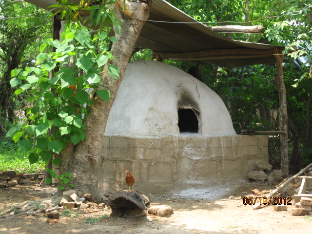 A Kitchen Oven in a Dome Shape on the Backyard